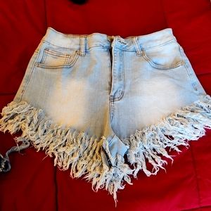 Distressed [light wash] denim shorts